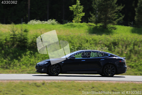 Image of Tesla Model S Electric Car on the Road