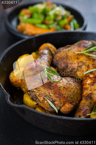 Image of Baked chicken legs with potatos