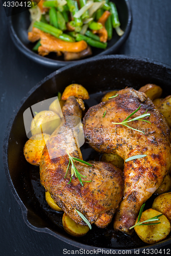 Image of Baked chicken legs with potatos