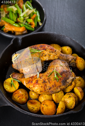 Image of Baked chicken legs with potatos