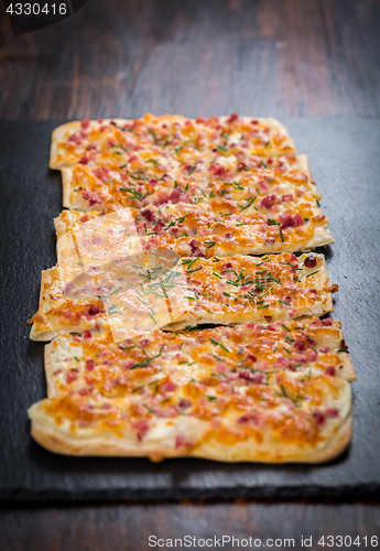 Image of Flammkuchen or Traditional Alsatian Pie