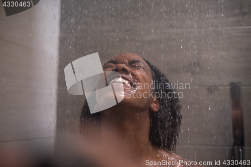 Image of African American woman in the shower