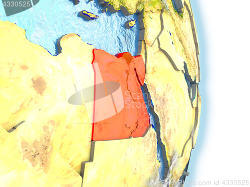 Image of Egypt in red on Earth