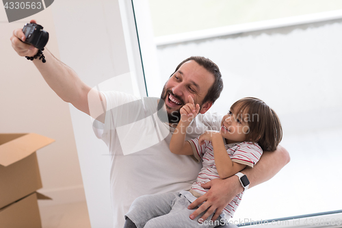 Image of selfie father and son