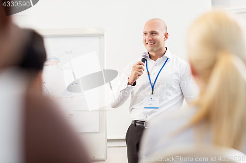 Image of group of people at business conference 