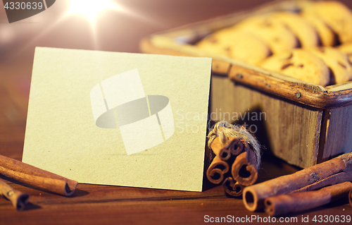 Image of close up of christmas oat cookies on wooden table