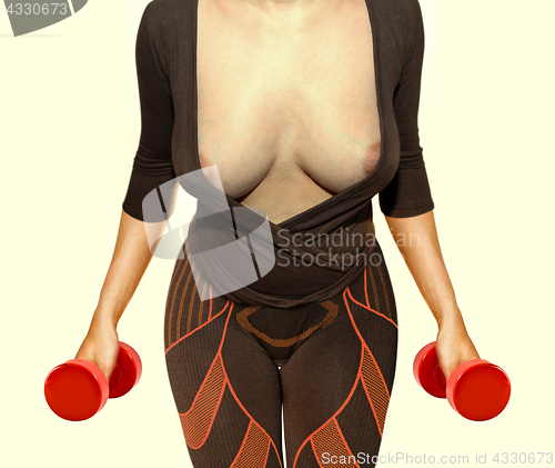 Image of working out with red dumbbells 