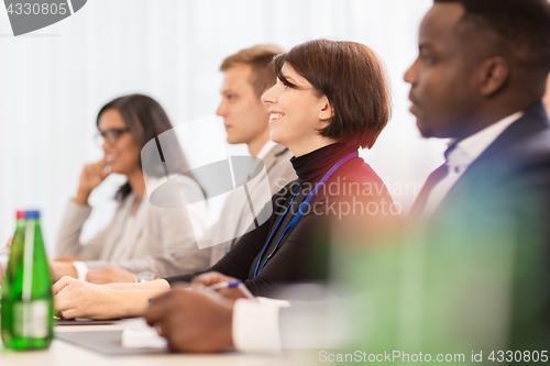 Image of happy business team at international conference