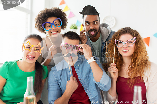 Image of happy team having fun at office party