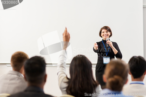 Image of group of people at business conference or lecture