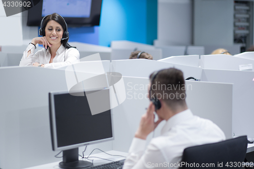 Image of female call centre operator doing her job