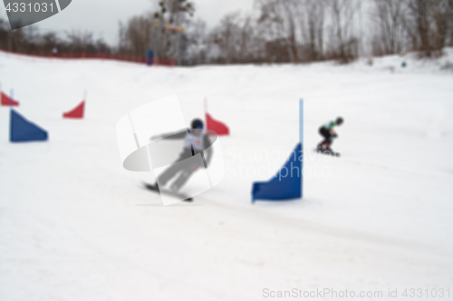 Image of Blurred view of snowboarding giant parallel slalom competitions