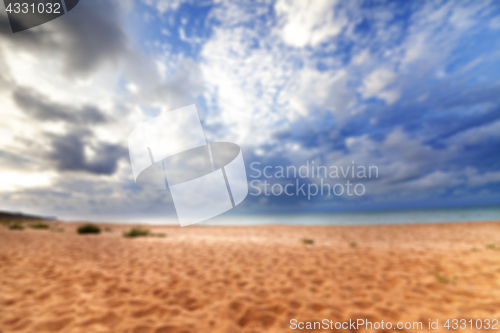 Image of Blurred sea beach in sun summer day