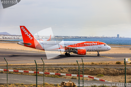 Image of ARECIFE, SPAIN - APRIL, 15 2017: AirBus A320 - 200 of easyjet re