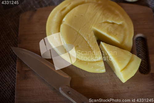 Image of aging cheese heads