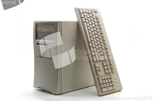 Image of Mini-tower PC and keyboard