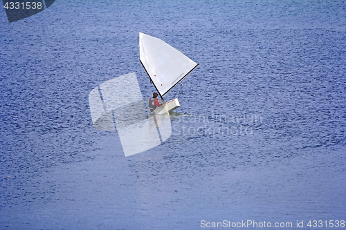 Image of Sports sailing in small boats on the lake