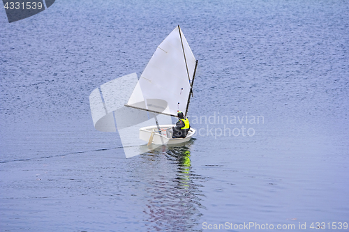 Image of Sports sailing in small boats on the lake