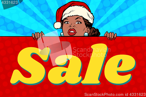Image of African Santa girl and sales poster