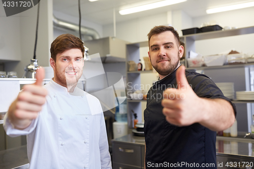 Image of chefs at restaurant kitchen showing thumbs up