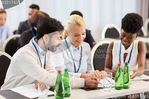 Image of happy business team at international conference