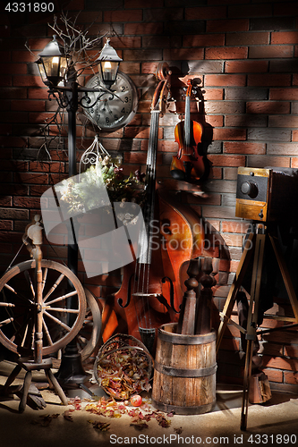 Image of Still Life With Old Camera And Musical Instruments 