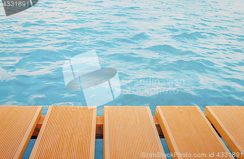 Image of Pier Planks Over Sea Background