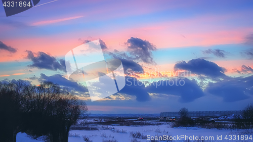 Image of Night Winter Landscape With Pink Clouds At Sunset