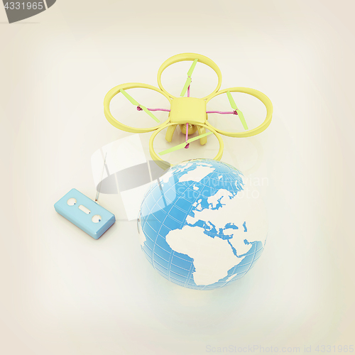 Image of Quadrocopter Drone with Earth Globe and remote controller on a w