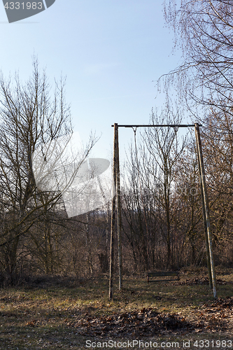 Image of old swing, close-up