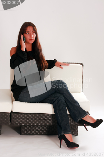 Image of Elegant woman telephoned