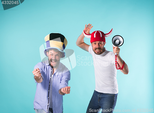 Image of Two Excited Male Friends Celebrate Watching Sports