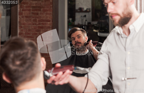 Image of Hipster client visiting barber shop