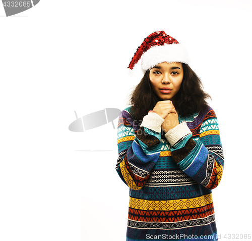 Image of cute young girl in santas red hat isolated