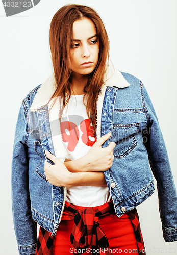 Image of young pretty teenage hipster girl posing emotional happy smiling on white background, lifestyle people concept 