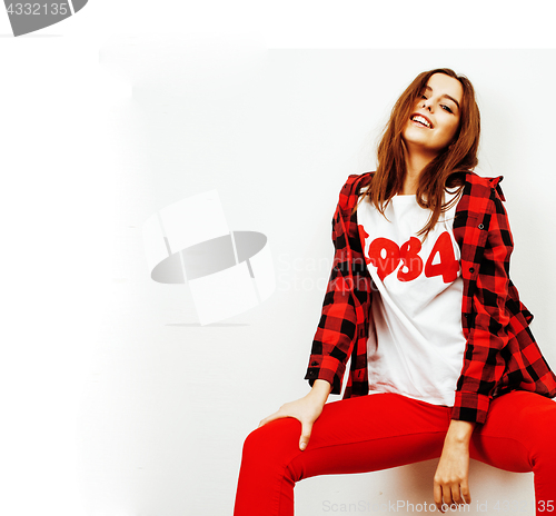 Image of young pretty teenage hipster girl posing emotional happy smiling