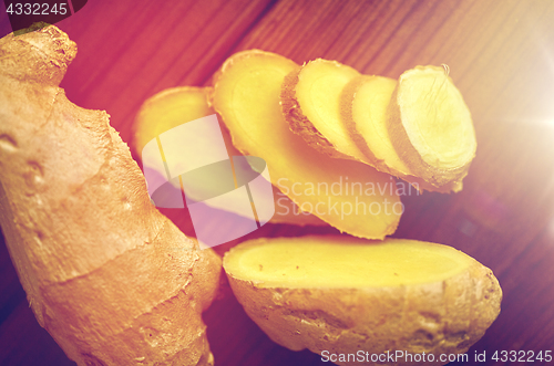 Image of close up of ginger root on wooden table