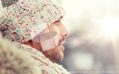 Image of face of happy man outdoors in winter
