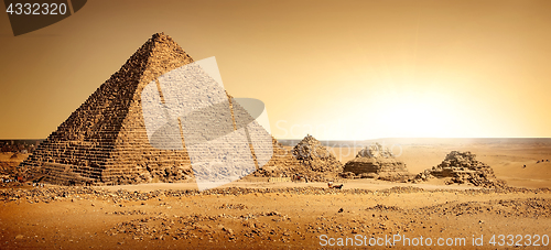 Image of Egyptian pyramids in sand