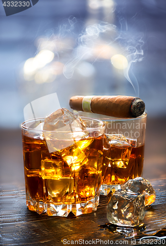 Image of Whiskey and cigar