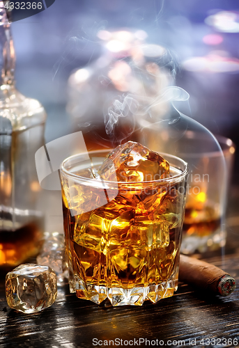 Image of Whiskey with ice cubes