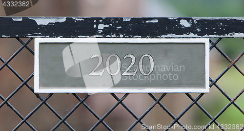 Image of Sign on fence - 2020