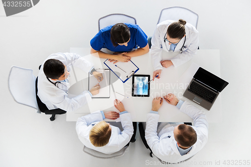 Image of doctors with spine x-ray on tablet pc computer