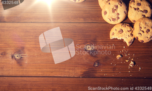 Image of close up of oat cookies on wooden table