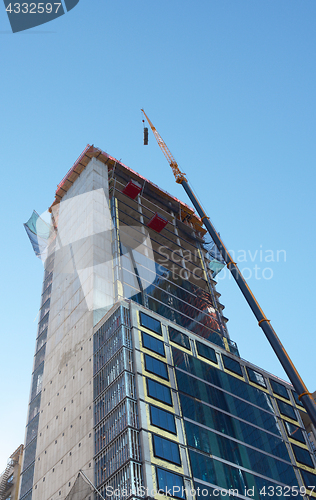 Image of Skyscraper under construction at Hudson Yards with a crane