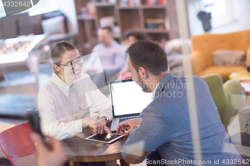Image of Business team Working With laptop in creative office