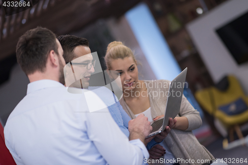 Image of Business team Working With laptop in creative office