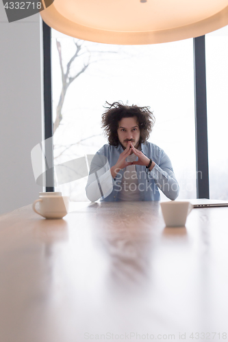 Image of Portrait of a young man at home