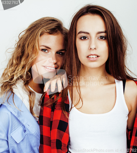 Image of best friends teenage girls together having fun, posing emotional on white background, besties happy smiling, lifestyle people concept 