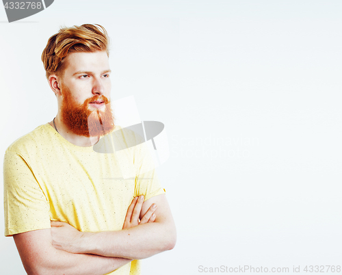 Image of portrait of young bearded hipster guy smiling on white backgroun